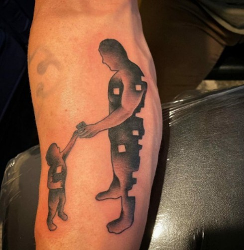 A Timeless Bond: Exploring the Symbolism and Significance of Father-Son Tattoos